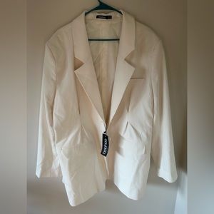 BooHoo white women’s blazer.